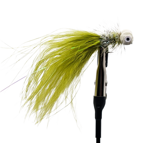 Fishing lure with green feathers and a white eye on a white background