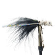 Fishing lure with black feathers and metallic body on a white background