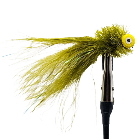 Fishing lure with green marabou feathers and a yellow eye on a white background