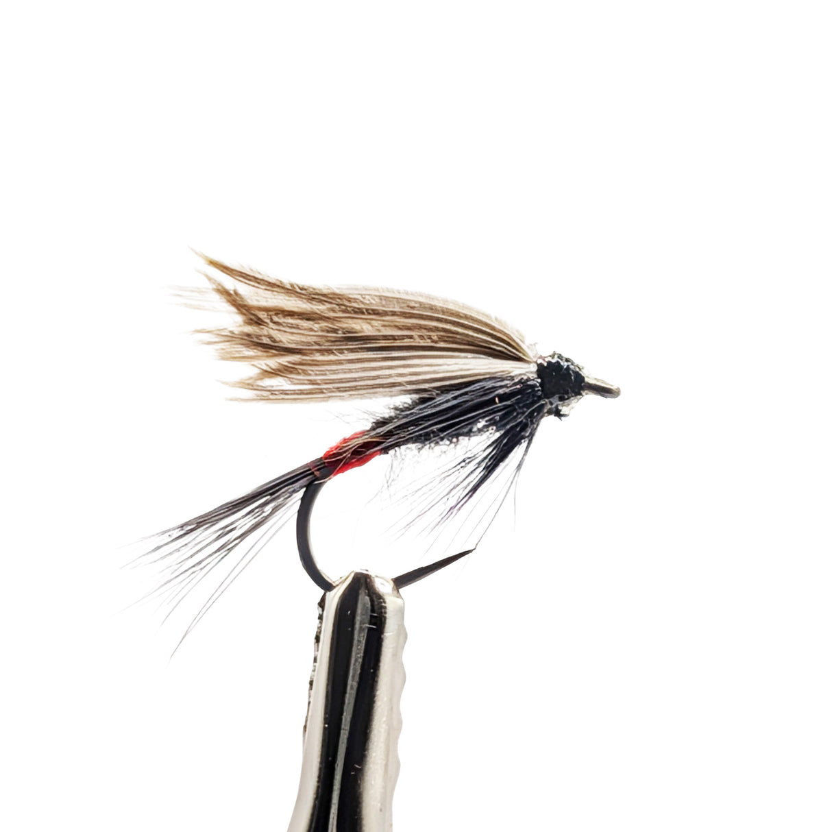 Close-up of Iron Blue Dun wet fly for trout fishing showing blue grey body and hackle detail