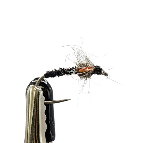 Muskin buzzer nymph fly with slim black body and ribbing