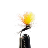 close up tricolour dry fly for trout fishing with banded body, parachute hackle and yellow and red post