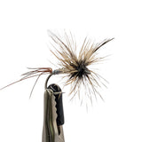 Spent mayfly dry fly for trout fishing with flat spent wings, pale body and low floating profile
